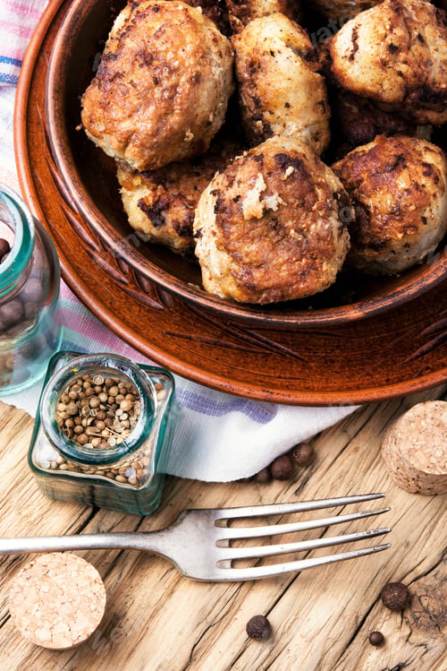 Preview: Homemade Rissole In Clay Ware On A Wooden Background