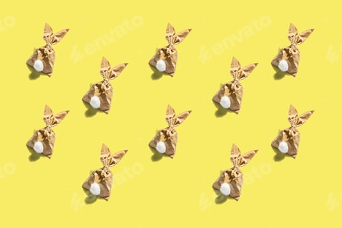 Preview: Easter Bunny Paper Gift Pattern On Yellow Background. Festive Texture, Greeting Card, Diy Concept