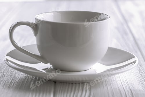 Preview: Coffee Cup On Wooden Background.