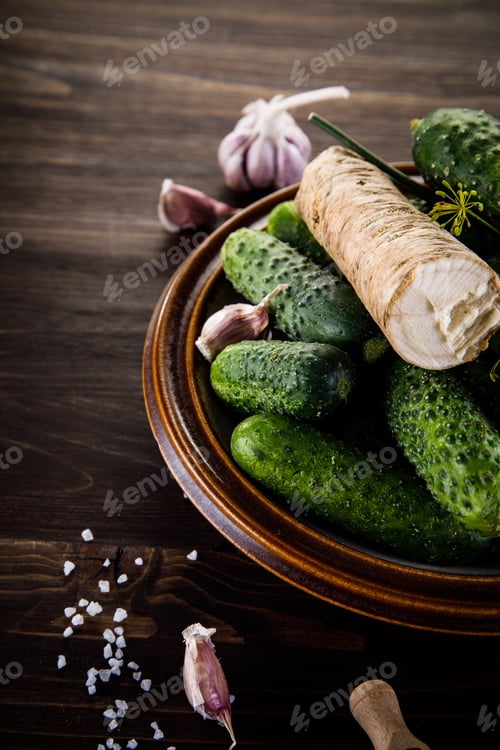 Preview: Raw Cucumbers, Garlic, Horseradish And Fennel On Wooden Background