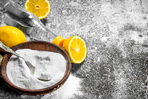 Preview: Baking Soda With Vinegar And Lemon. On Rustic Background.