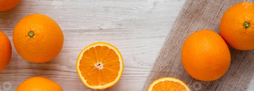 Preview: Fresh Ripe Organic Oranges On A White Wooden Surface, Top View. Flat Lay, Overhead, From Above