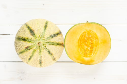 Preview: Group Of One Whole One Half Of Fresh Melon Cantaloupe Variety Flatlay On Grey Wood