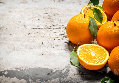 Preview: Fresh Oranges With Leaves. On The Rustic Background. Free Space For Text .