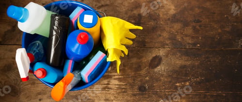 Preview: Cleaning Products On Wooden Surface. House Cleaning Concept. Top View. From Above. Space For Text.