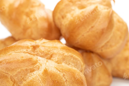 Preview: Lot Of Whole Baked Golden Profiterole Macro Isolated On White Background