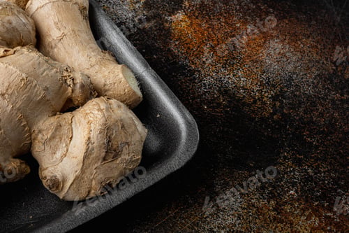 Preview: Fresh Ginger Root Or Rhizome Set, In Plastic Market Container, On Old Dark Rustic Background, With