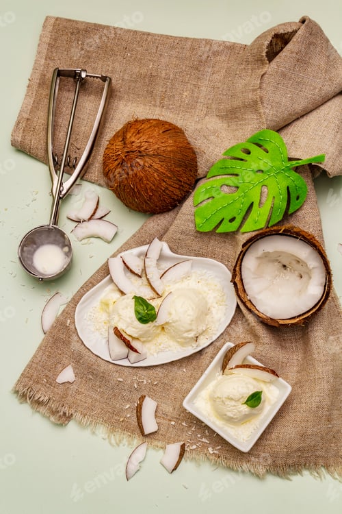 Preview: Lactose Free Coconut Ice Cream. Special Spoon, Halves Of Fruit, Flakes. Vegan Dessert Concept
