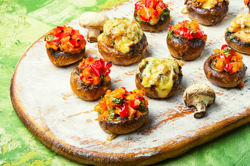 Preview: Italian Vegetarian Stuffed Mushrooms On Cutting Board.Italian Food.Party Snack