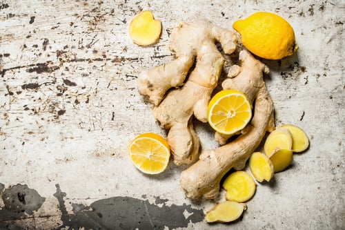Preview: Fresh Ginger With Lemons. On Rustic Background.