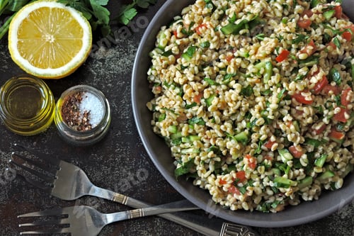Preview: Arabic Salad Tabbouleh In A Bowl. Middle Eastern Cuisine. Healthy Salad With Bulgur, Parsley And