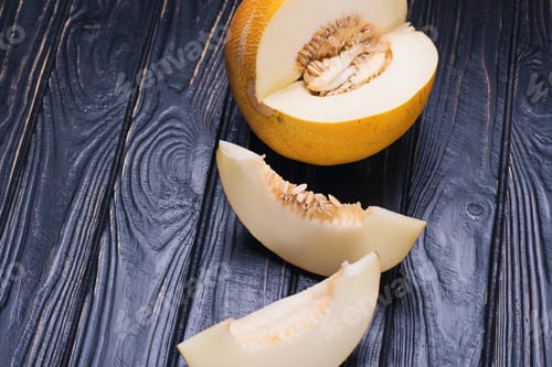 Preview: Fresh Ripe Raw Yellow Melon With Several Pieces