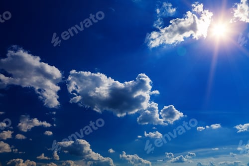 Preview: Blue Sky with White Clouds and Sunlight