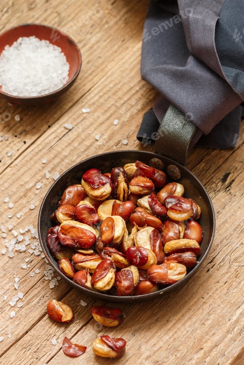 Preview: Vicia Faba. Crispy Fried (Roasted) Broad Beans With Salt In A Frying Pan Close-Up On A Wooden Old