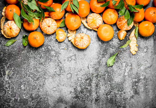 Preview: Fresh Tangerines With Leaves. On A Rustic Background.