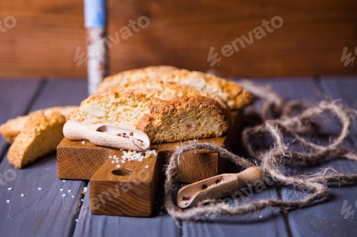 Preview: Crispy Salted Bread, Scoop With Salt Crystalls On Wooden Table. Salty Junk, Unhealthy Snacks, Fast