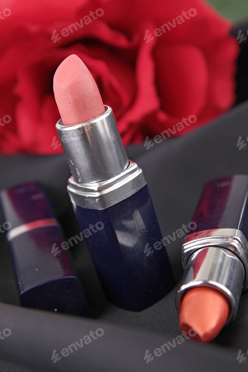 Preview: Lipsticks And Red Rose On Silk Drape