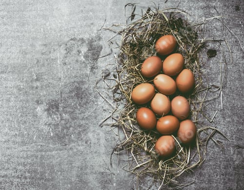 Preview: A Set Of Eggs In The Hay. On A Stone Background. Free Space For Text . Top View