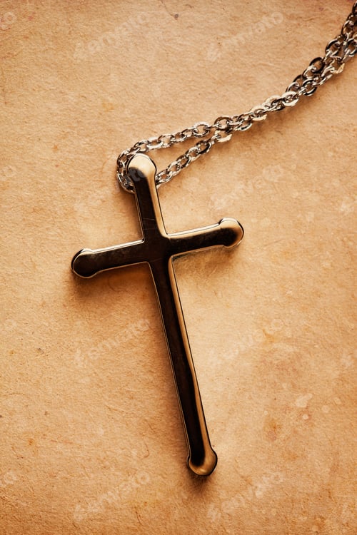 Preview: Closeup Of Silver Christian Cross On Bible