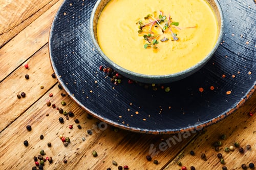 Preview: Autumn Creamy Pumpkin Soup In A Bowl.Pumpkin And Carrot Soup.Dietary Food
