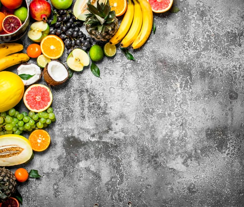 Vista previa: Variety Of Fresh Fruits. On Rustic Background .