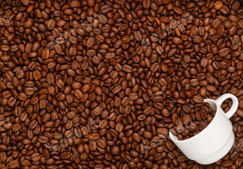 Preview: Roasted Coffee Beans And A White Espresso Cup. Culinary Background. Top View, Selective Focus