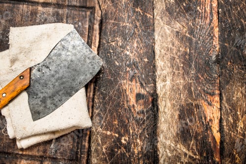 Preview: Serving Background. Old Hatchet On A Chopping Board. On A Wooden Table.