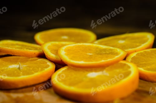 Preview: Slices Of The Orange On Wooden Table