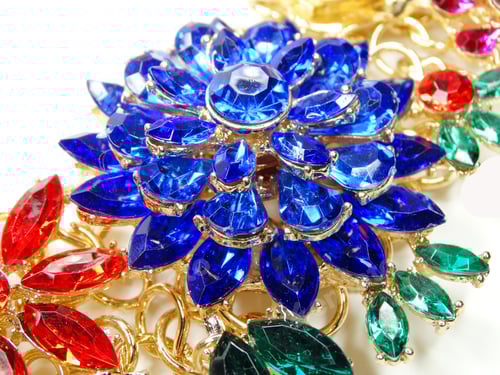 Preview: Close-up of Jeweled Ornament in Gold, Blue, Red