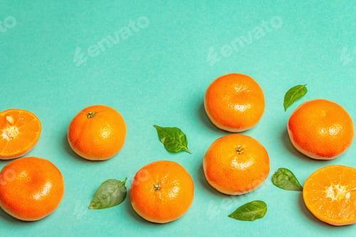 Preview: Ripe Juicy Tangerines And Fresh Leaves. Sunny Summer Turquoise Background, Copy Space