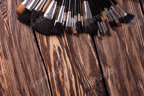 Preview: Set Of Different Brushes For Make-Up On Wooden Background. Professional Makeup Accessories.