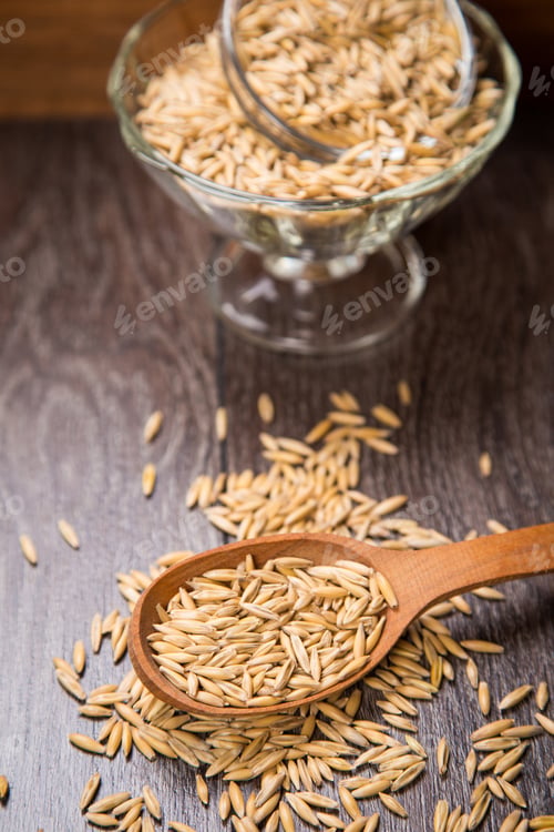 Preview: Ripe Dry Oat Is In A Wooden Spoon, In A Studio