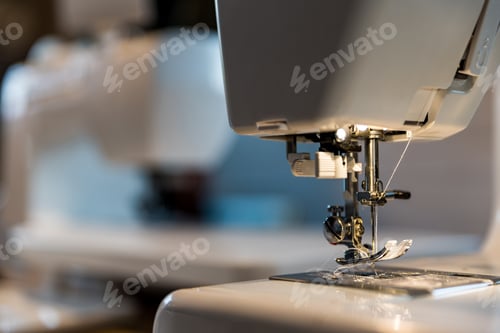 Preview: Close Up Of Presser Foot In Sewing Machine With Needle And Thread. Concept Of Sewing Hobby