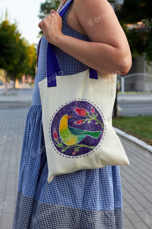Preview: Woman Holding White Linen Eco Bag Decorated With Painting Of Birds And Flowers