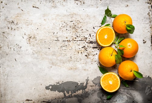 Preview: Fresh Oranges With Leaves. On The Rustic Background. Free Space For Text . Top View