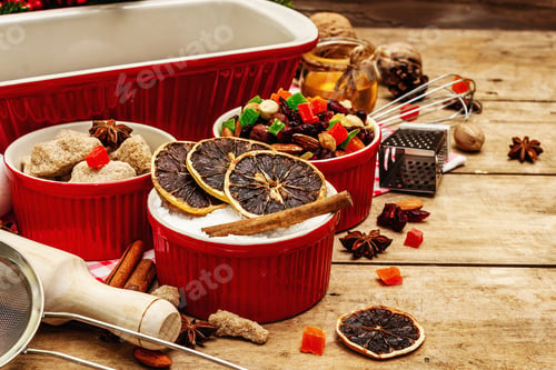 Preview: Christmas Baking Background 2021. Traditional Saxon Stollen With Fruits And Nuts. Food Ingredients