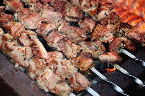 Preview: Meat Skewers On The Barbecue Coals