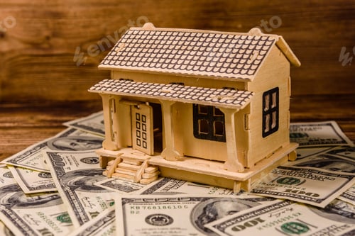 Preview: Plywood Model Of House And One Hundred Dollar Banknotes. Loan, Real Estate Concept