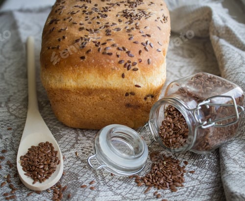 Preview: Bread With Flax Seed On A Linen Towel