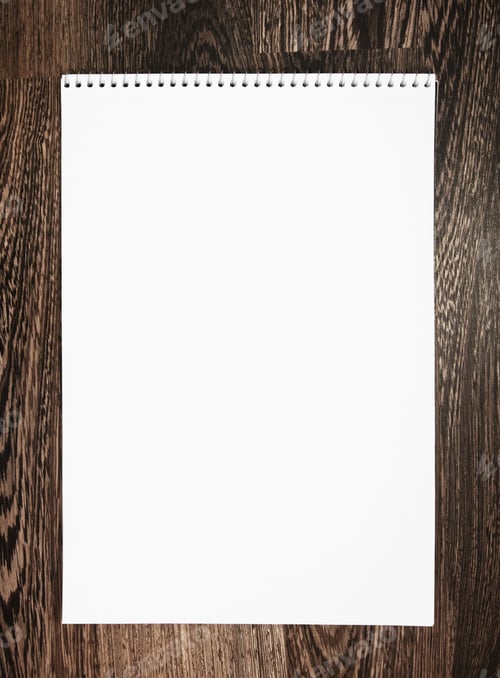 Preview: Notebook On A Wooden Background.