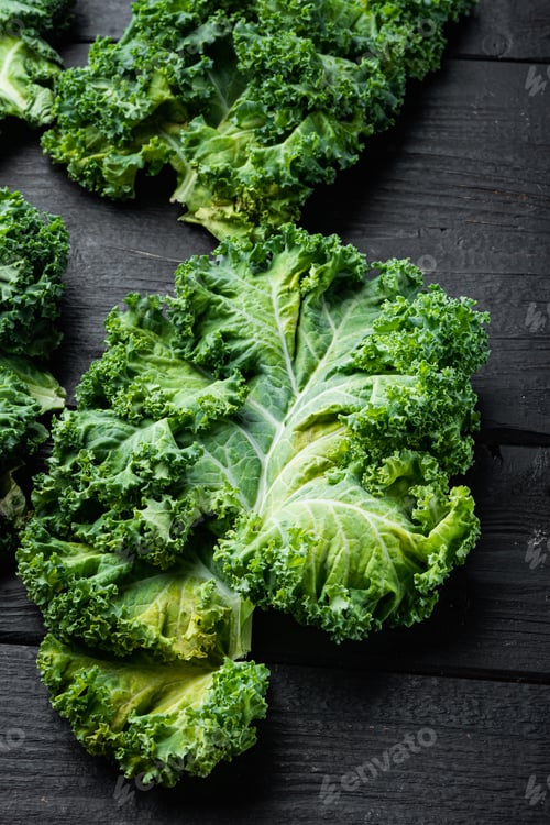 Preview: Green Kale Salad Leaf Set, On Black Wooden Table Background