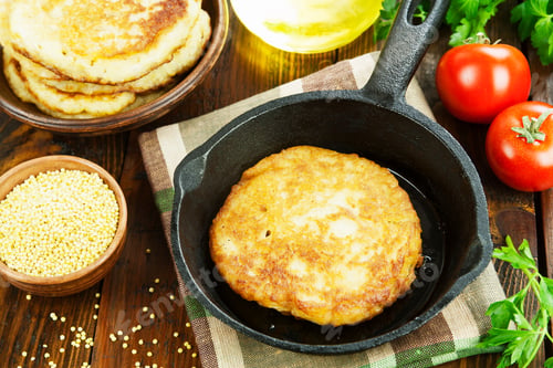 Preview: Unsweetened Millet Pancakes In A Pan On The Table
