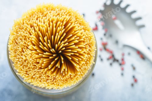 Preview: Raw Unprepared Spaghetti For Cooking A Delicious Lunch Or Dinner. Selective Focus