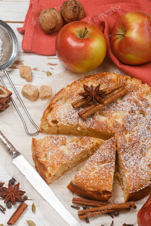 Preview: Homemade Apple Pie With Cinnamon, Cardamom And Star Anise Closeup. Traditional Autumn Cakes For