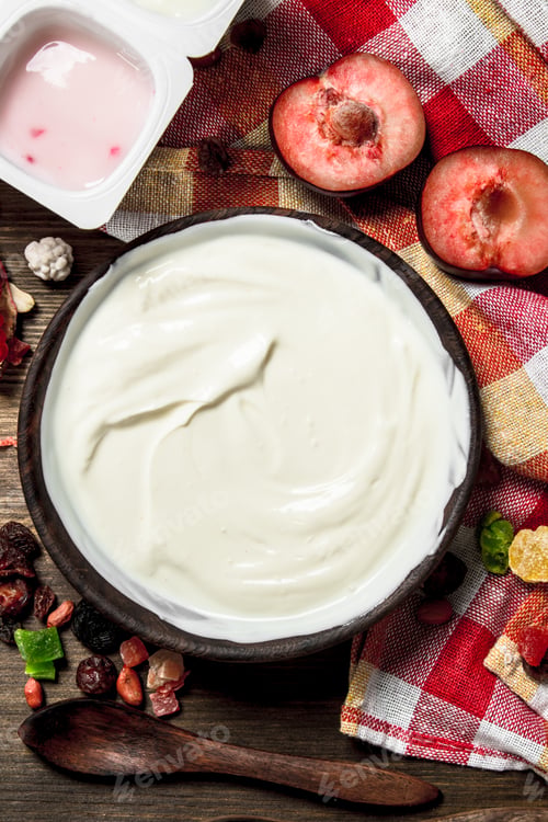 Preview: Fresh Yogurt With Fruit. On A Wooden Table.