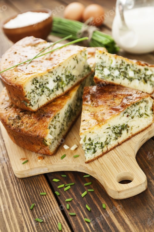 Preview: Pie With Spring Onion And Eggs On The Table