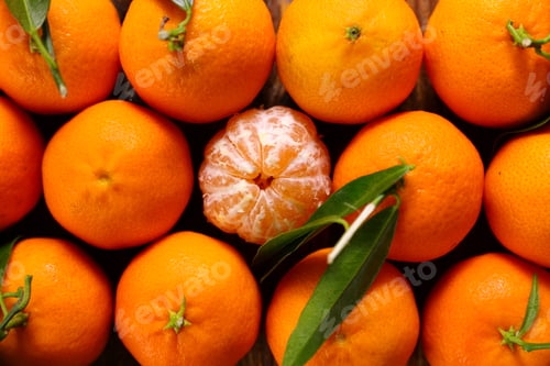 Preview: Close Up On Clementine And Leaf Background