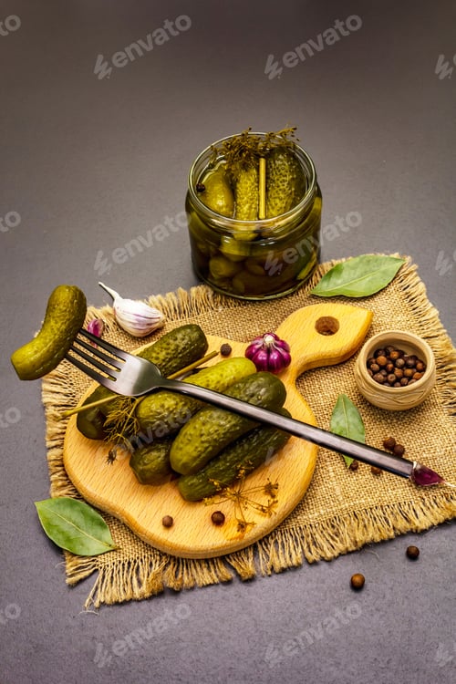 Preview: Marinated Pickled Cucumbers With Spices And Herbs. Traditional Eastern Europe Appetizer In Glass