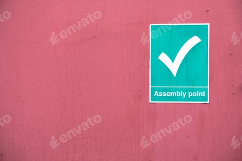 Preview: Fire Assembly Point Sign At Workplace Car Park Fence Wall