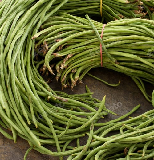 Fresh Green Beans Bundled on a Wooden Surface